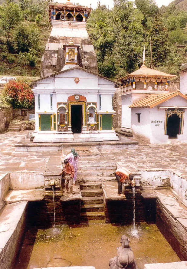A small shrine built above a stone water tank